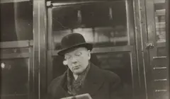 Subway Portrait (man reading) by Helen Levitt, 1938-1941, Gelatin silver print, sold Apr 2025