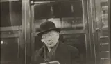 Helen Levitt, Subway Portrait (man reading)