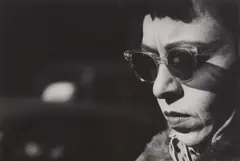 Chicago (woman with sunglasses) by Harry Callahan, circa 1950, Gelatin silver print, offered Apr 2025