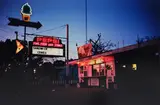William Eggleston, Untitled (hamburger stand at night)