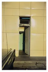 Untitled (restroom door) by William Eggleston, circa 1972, Dye transfer print, printed 2008, sold Jun 2025