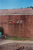 William Eggleston, Untitled (wall with club sign), circa 1972, Dye transfer print, printed 2008