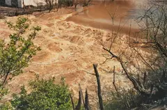 Untitled (flooded river) by William Eggleston, circa 1982-1986, Dye transfer print, printed 1999, sold Jun 2025
