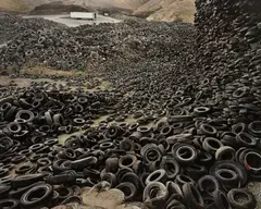 Edward Burtynsky, Oxford Tire Piles #1, Westley, California, USA, 1999, Pigment Inkjet print, printed 2025