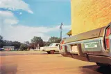 William Eggleston, Untitled (bank parking lot, Plains), 1976, Dye transfer print, printed 2011