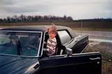 William Eggleston, Untitled (boy and car)
