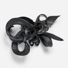 Chakaia Booker, Juxtaposed, 2006, rubber tire and wood