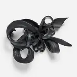 Chakaia Booker, Juxtaposed, 2006, rubber tire and wood