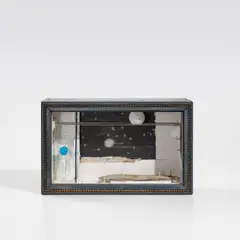 Joseph Cornell, Cassiopeia #2, 1960-1961, painted wood and glass, printed paper collage, metal rods, clay pipe, cork ball, marble, mirror, driftwood and nails in a wood box construction