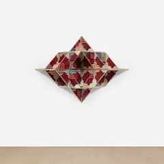 Sanford Biggers, Banneker, 2016, antique quilt and gold leaf on birch plywood
