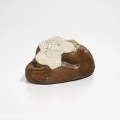 Baked Potato, from 7 Objects in a Box (P. 3) by Claes Oldenburg, 1966, Cast resin multiple with hand-painting, lacking the original Shenango china dish, sold Apr 2024