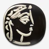 Profil de Jacqueline (Jacqueline's Profile) (A.R. 385) by Pablo Picasso, 1956, White earthenware plaque painted in black with partial brushed glaze; ceramic, Madoura edition, sold Sep 2024