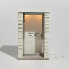 Maurizio Cattelan, The 1:6 Scale Wrong Gallery, 2006, Multiple comprising wood, brass, steel, aluminum, resin, plastic, glass and electric lighting, with accompanying copy of the Wrong Gallery Times, all contained in the original cardboard box