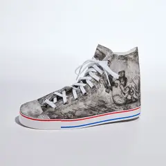 Jose Guinto, found object: shoe/From Crusoe to Katrina, 2007, Mixed media multiple of etching, aquatint and screenprint in colors, on Masa and Coventry Rag papers, with shoelace and grommets