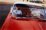 William Eggleston, Untitled (Couple in Red Car at Drive-In Restaurant), Memphis, TN