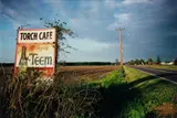 Untitled (Torch Café Billboard), Mississippi by William Eggleston, circa 1973, Dye transfer print from Dust Bells, Volume II , printed 2004, sold Apr 2024