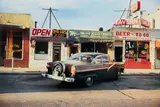 William Eggleston, Untitled (Old Ford and Stores)