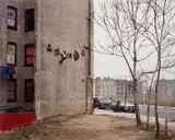 Joel Sternfeld, The Bronx, New York (Sculpture by John Ahearn and Rigoberto Torres), November, 1982, Chromogenic print, printed 1984