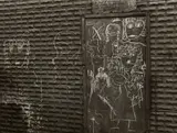 Helen Levitt, N.Y.C. (graffiti of figures on metal door)