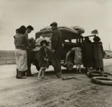 Migrants, Family Of Mexicans, On the Road with Tire Trouble. Looking for Work in the Peas by Dorothea Lange, 1936, Gelatin silver print, offered Apr 2024