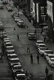 Bruce Davidson, Playing Stickball on Seventeenth Street and Eighth Avenue, Brooklyn, N.Y., from Brooklyn Gang, 1959, Gelatin silver print, printed later
