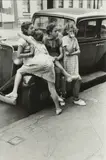 Helen Levitt, N.Y. (four girls against car)
