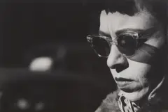 Chicago (woman with sunglasses) by Harry Callahan, circa 1950, Gelatin silver print, offered Apr 2024