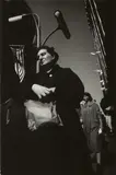 Harry Callahan, Chicago (woman carrying paper bag)