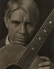 Carl Sandburg with Guitar by Edward Steichen, circa 1928, Platinum or palladium print, offered Apr 2024