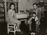 A Young Lawyer and his Family at Manzanar by Ansel Adams, 1943, Gelatin silver print, likely an early print, sold Apr 2024