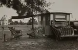 Walker Evans, Untitled (recreation vehicle with striped canopies and lawn chair), Sarasota, FL, 1941, Gelatin silver print