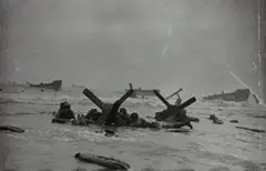 D-Day Landing, Omaha Beach, Normandy by Robert Capa, 1944, Gelatin silver print, printed later, sold Apr 2024