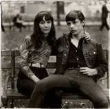 Young couple on a bench in Washington Square Park, N.Y.C. by Diane Arbus, 1965, Gelatin silver print, printed later by Neil Selkirk, sold Apr 2024