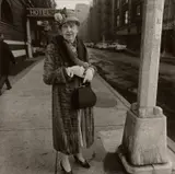 Woman by a lampost, N.Y.C. by Diane Arbus, 1963, Gelatin silver print, printed later by Neil Selkirk, sold Oct 2024