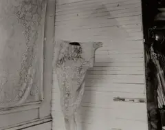 Untitled (self-portrait in curtain) by Francesca Woodman, 1980, Gelatin silver print, sold Oct 2024