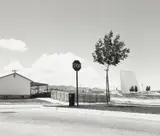Robert Adams, Tract house & outdoor theater, Colorado Springs, Colorado, 1969, Gelatin silver print, printed 1982