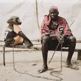 Pieter Hugo, Abdulahi Galadima with the Monkey Amiloo, Nigeria from The Hyena and Other Men