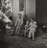 A California fruit tramp and his family in the Marysville migrant camp by Dorothea Lange, 1935, Gelatin silver print, sold Oct 2024