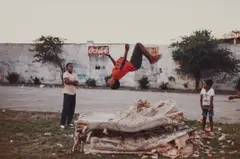 Jamel Shabazz, Flying High from Back in the Days, 1982, Chromogenic print, printed later
