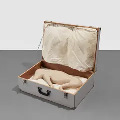 Mark Manders, Suitcase with Dog and Pillows (Fragment from a Self-Portrait as a Building), 1992, painted ceramic, wood suitcase and pillows