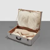 Mark Manders, Suitcase with Dog and Pillows (Fragment from a Self-Portrait as a Building), 1992, painted ceramic, wood suitcase and pillows