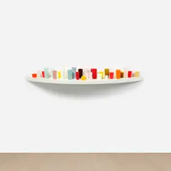 George Stoll, Untitled (30 Cups on a 74 x 12 inch Curved Shelf #4), 2004, beeswax, paraffin and pigment on wooden shelf