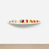 George Stoll, Untitled (30 Cups on a 74 x 12 inch Curved Shelf #4), 2004, beeswax, paraffin and pigment on wooden shelf