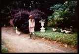 Nan Goldin, Joana walking with geese, outside Paris