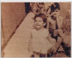 Félix González-Torres, "Untitled" (Me and My Sister), 1988, chromogenic print jigsaw puzzle in plastic bag