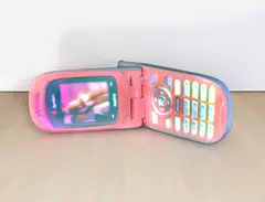 Tony Oursler, Cherry Nokia, 2008, DVD, DVD player and video projector on resin