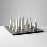 Sol LeWitt, Nine Pyramids on a Nine-Part Grid, 1991, White painted cast polyurethane resin multiples, on a grey painted Formica base