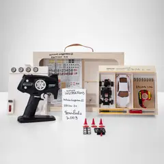 Nutsy's Deluxe Racing Set by Tom Sachs, 2003, The complete set of one Kyosho Mini-Z-Racer (ready to use) with replacement tires, sticker, Scotch Tape, pencil, crown c, sold Apr 2023