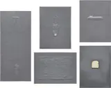 Jasper Johns, High School Days, The Critic Smiles, Flag, Light Bulb, and Bread, from Lead Reliefs (G. 129-133; ULAE 72-76), 1969, The complete set of five lead reliefs with polystyrene and wood backing, one with an inset mirror, one with rag paper hand-painted in oil by the artist, and one with tin leaf and gold plating, all in the original publisher's welded aluminum frames