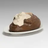 Claes Oldenburg, Baked Potato, from 7 Objects in a Box (P. 3), 1966, Cast resin multiple with hand-painting, with the original Shenango china dish